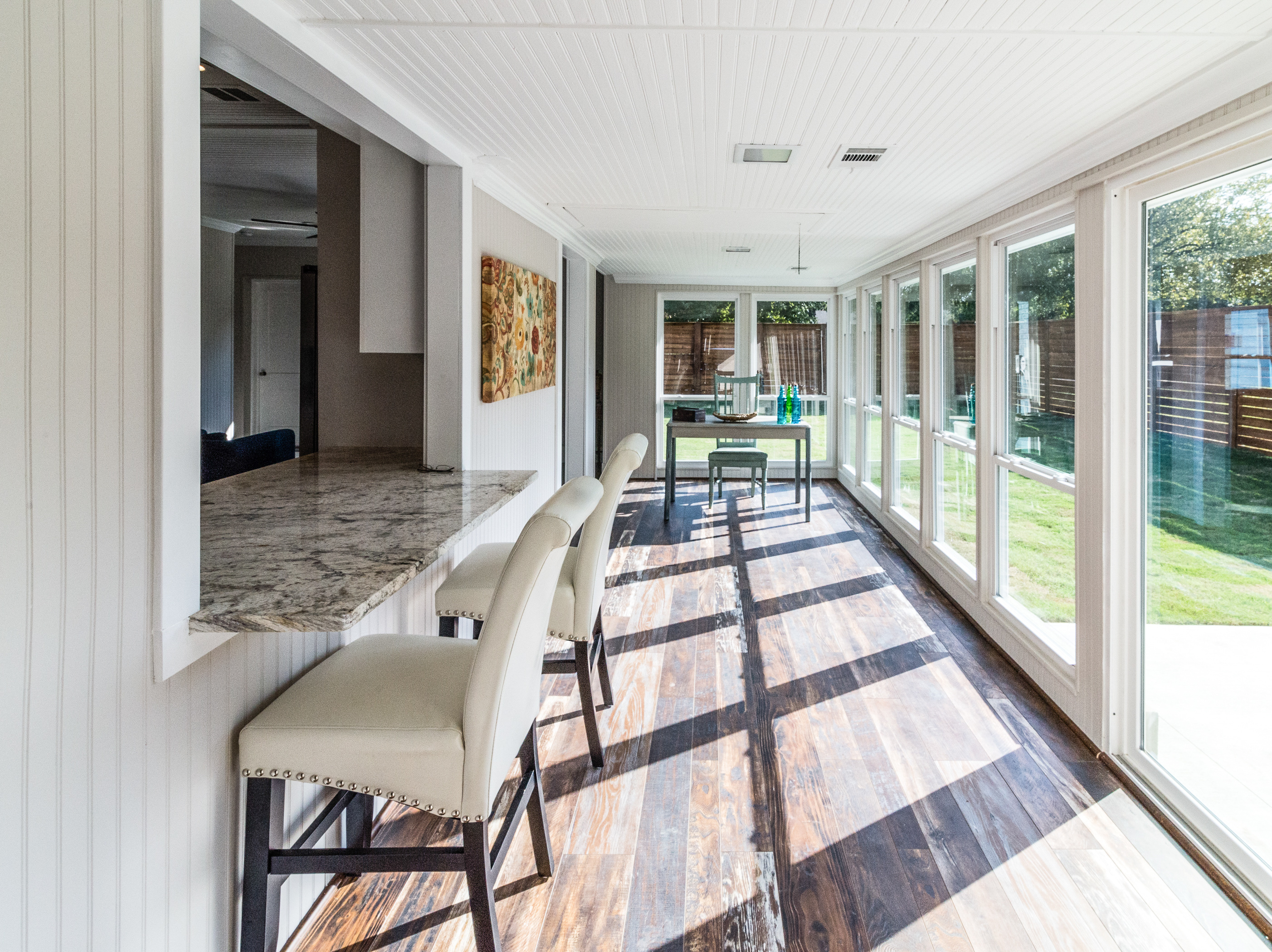 Workspace in sunroom, natural light, remodel